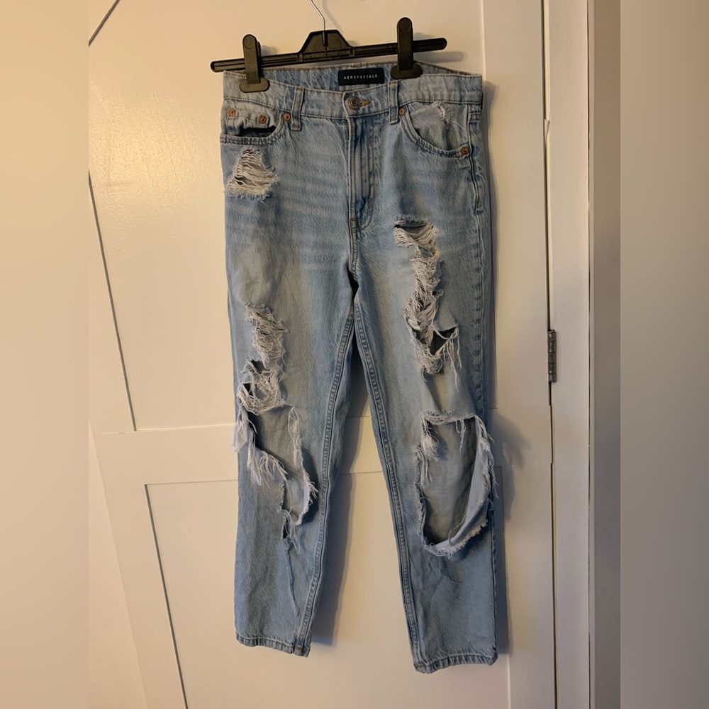 Great pair of Mom Jeans with ripped knees